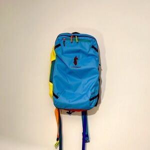 Cotopaxi Blue and Yellow Backpack with Sporty Design